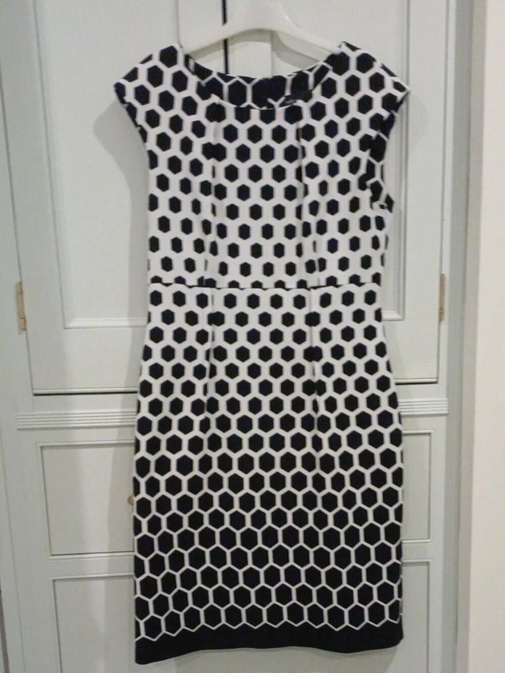 A dress with a white and black pattern